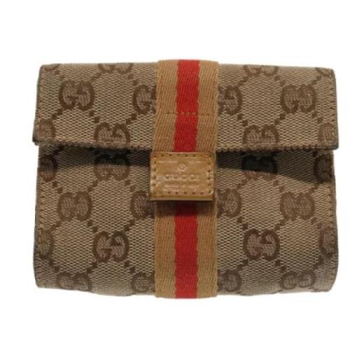 Pre-owned Canvas clutches Gucci Vintage , Beige , Dames