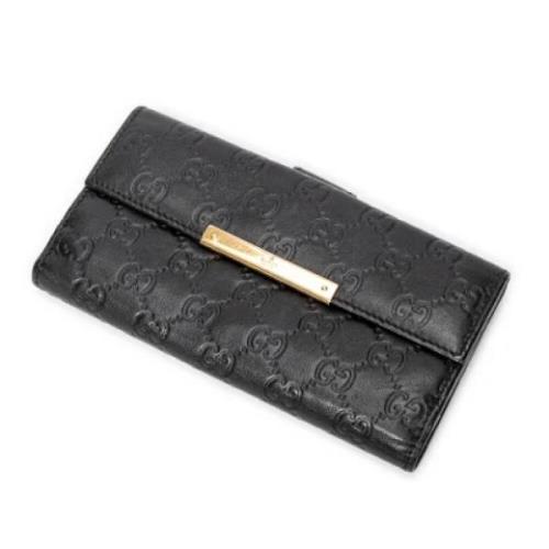 Pre-owned Leather wallets Gucci Vintage , Black , Dames