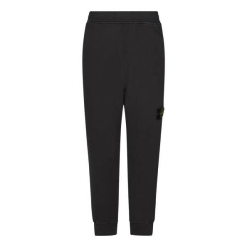 Grijze elastische broek met geribbelde onderkant Stone Island , Gray ,...