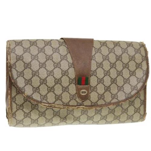 Pre-owned Leather clutches Gucci Vintage , Beige , Dames