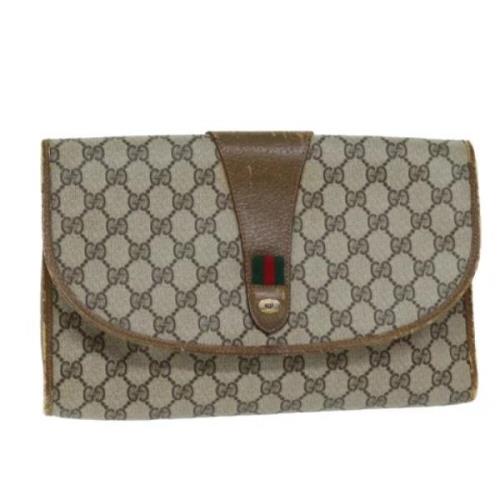 Pre-owned Leather clutches Gucci Vintage , Beige , Dames