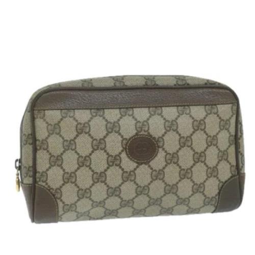 Pre-owned Leather clutches Gucci Vintage , Beige , Dames