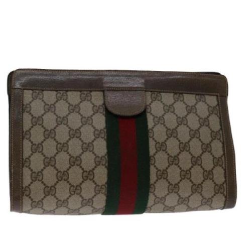 Pre-owned Leather clutches Gucci Vintage , Beige , Dames