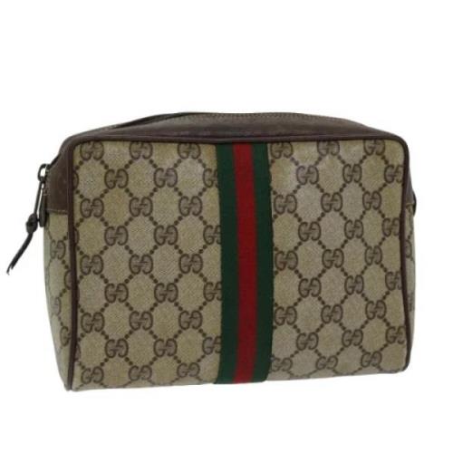 Pre-owned Leather clutches Gucci Vintage , Beige , Dames