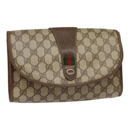 Pre-owned Canvas clutches Gucci Vintage , Beige , Dames