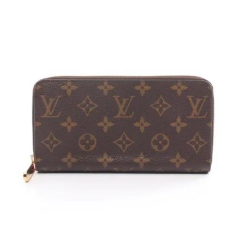 Pre-owned Leather wallets Louis Vuitton Vintage , Brown , Dames