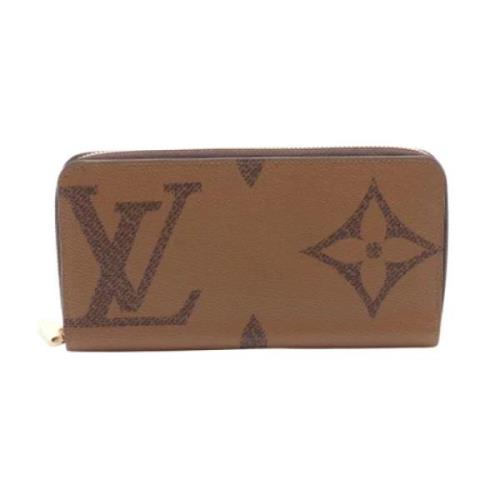 Pre-owned Leather wallets Louis Vuitton Vintage , Brown , Dames