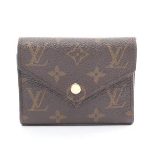 Pre-owned Leather wallets Louis Vuitton Vintage , Brown , Dames