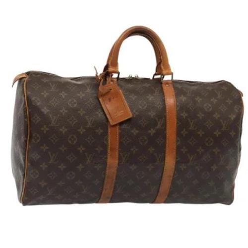 Pre-owned Canvas travel-bags Louis Vuitton Vintage , Brown , Heren