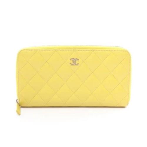 Pre-owned Fabric wallets Chanel Vintage , Yellow , Dames