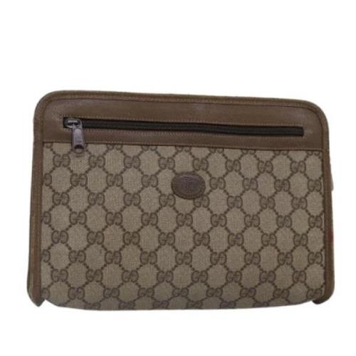 Pre-owned Leather clutches Gucci Vintage , Beige , Dames