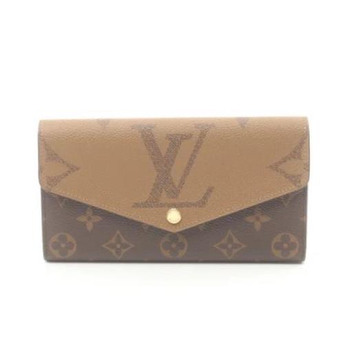 Pre-owned Leather wallets Louis Vuitton Vintage , Brown , Dames