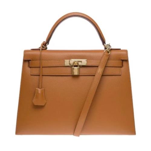 Pre-owned Leather handbags Hermès Vintage , Orange , Dames