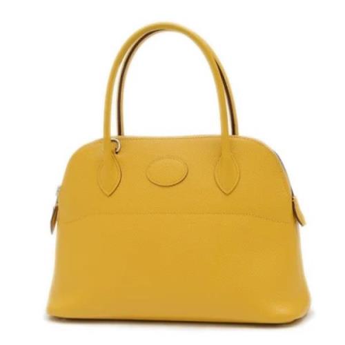 Pre-owned Leather handbags Hermès Vintage , Yellow , Dames