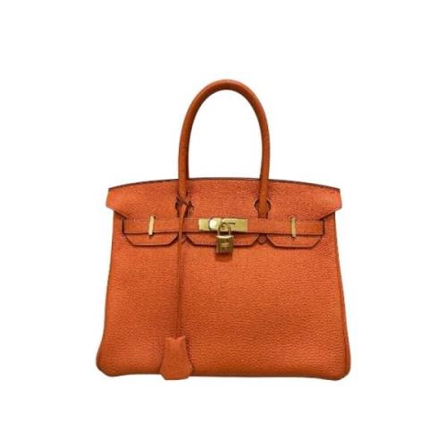 Pre-owned Leather handbags Hermès Vintage , Orange , Dames