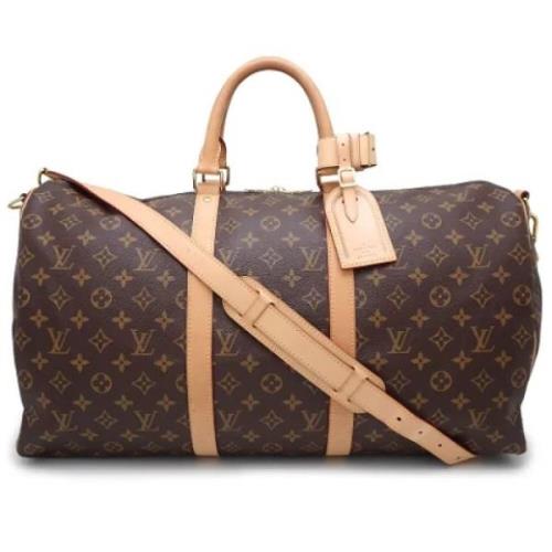 Pre-owned Canvas handbags Louis Vuitton Vintage , Brown , Dames