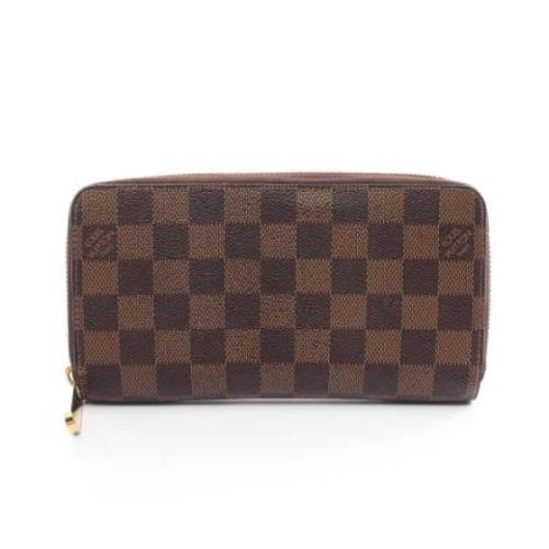 Pre-owned Leather wallets Louis Vuitton Vintage , Brown , Dames