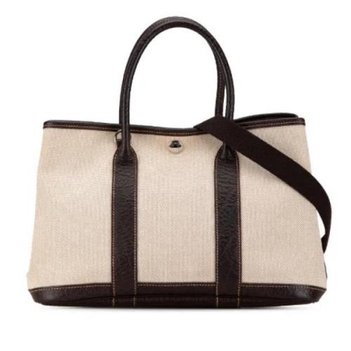 Pre-owned Canvas handbags Hermès Vintage , Beige , Dames