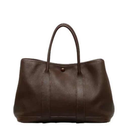 Pre-owned Leather handbags Hermès Vintage , Brown , Dames