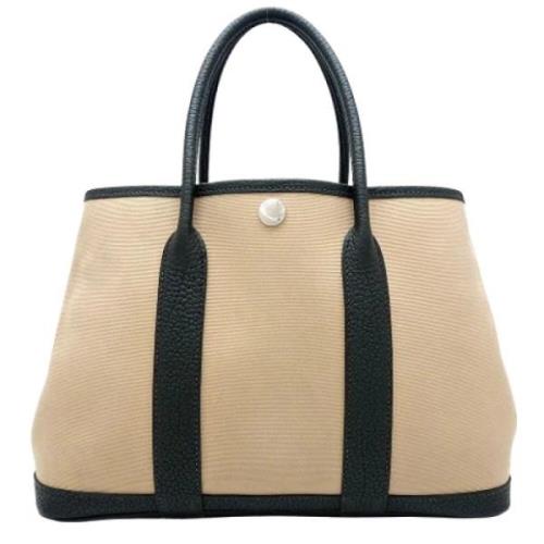 Pre-owned Canvas handbags Hermès Vintage , Beige , Dames