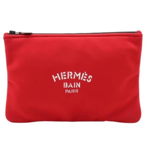 Pre-owned Canvas clutches Hermès Vintage , Red , Dames