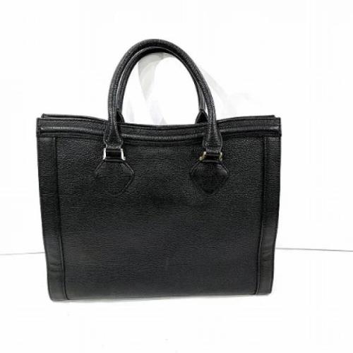 Pre-owned Leather handbags Yves Saint Laurent Vintage , Black , Dames