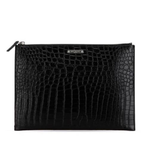 Pre-owned Leather clutches Yves Saint Laurent Vintage , Black , Dames