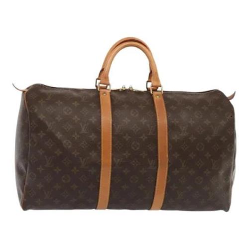 Pre-owned Canvas travel-bags Louis Vuitton Vintage , Brown , Dames