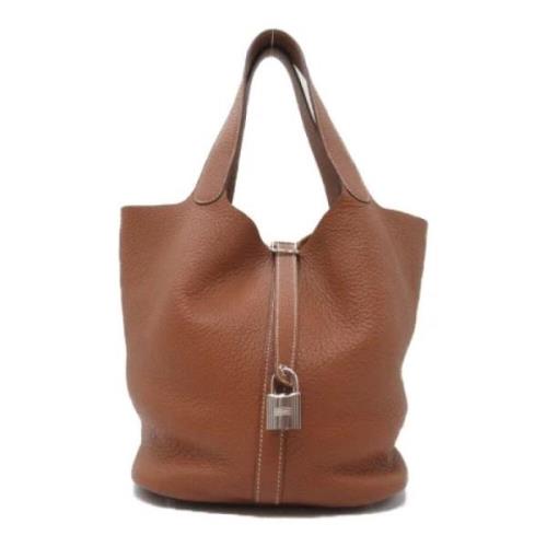 Pre-owned Leather handbags Hermès Vintage , Brown , Dames