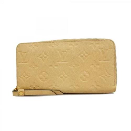 Pre-owned Leather wallets Louis Vuitton Vintage , Yellow , Dames