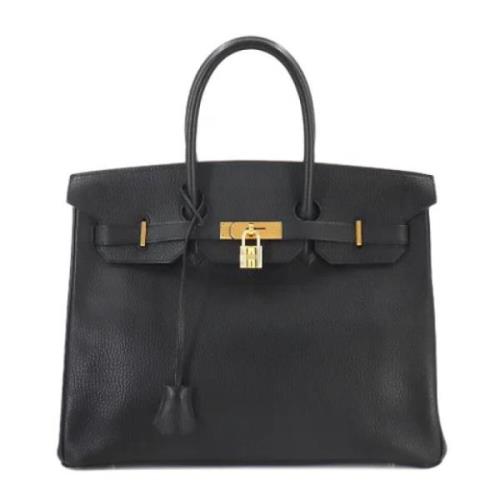 Pre-owned Leather handbags Hermès Vintage , Black , Dames