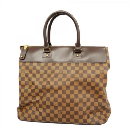 Pre-owned Fabric handbags Louis Vuitton Vintage , Brown , Dames