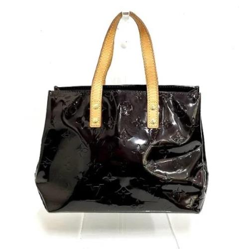 Pre-owned Leather handbags Louis Vuitton Vintage , Brown , Dames