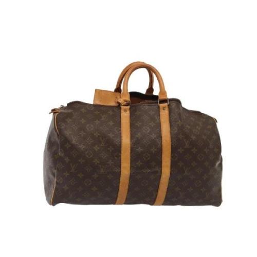 Pre-owned Canvas handbags Louis Vuitton Vintage , Brown , Dames