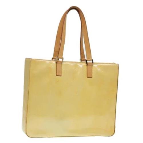 Pre-owned Leather handbags Louis Vuitton Vintage , Yellow , Dames