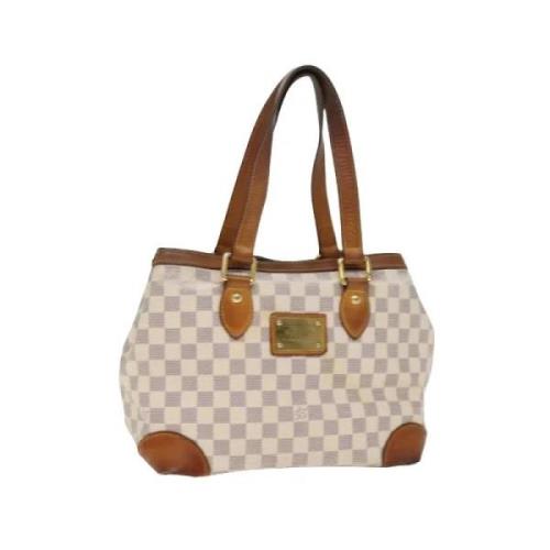 Pre-owned Canvas shoulder-bags Louis Vuitton Vintage , Beige , Dames