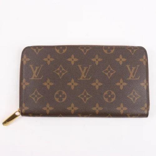 Pre-owned Leather wallets Louis Vuitton Vintage , Brown , Dames