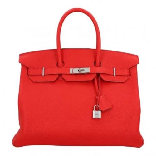 Pre-owned Leather handbags Hermès Vintage , Red , Dames