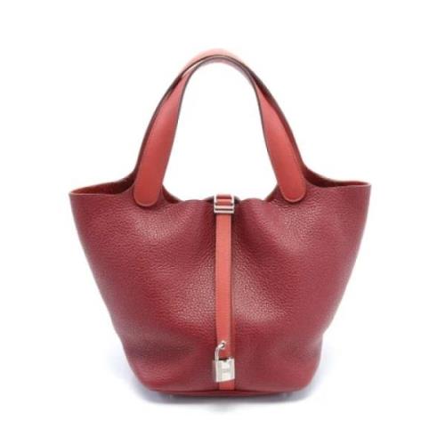 Pre-owned Leather handbags Hermès Vintage , Red , Dames