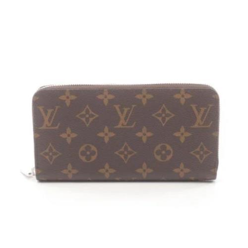 Pre-owned Leather wallets Louis Vuitton Vintage , Brown , Dames