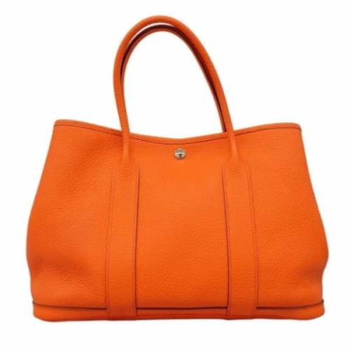 Pre-owned Leather totes Hermès Vintage , Orange , Dames