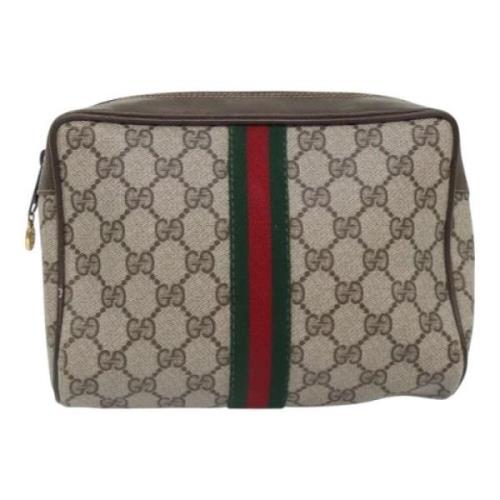 Pre-owned Leather clutches Gucci Vintage , Beige , Dames