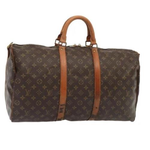 Pre-owned Canvas travel-bags Louis Vuitton Vintage , Brown , Dames