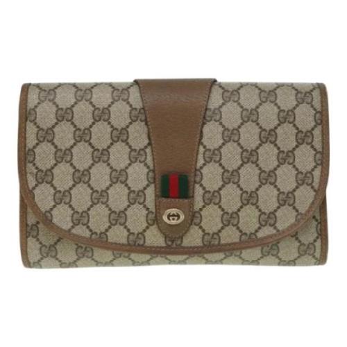 Pre-owned Leather clutches Gucci Vintage , Beige , Dames