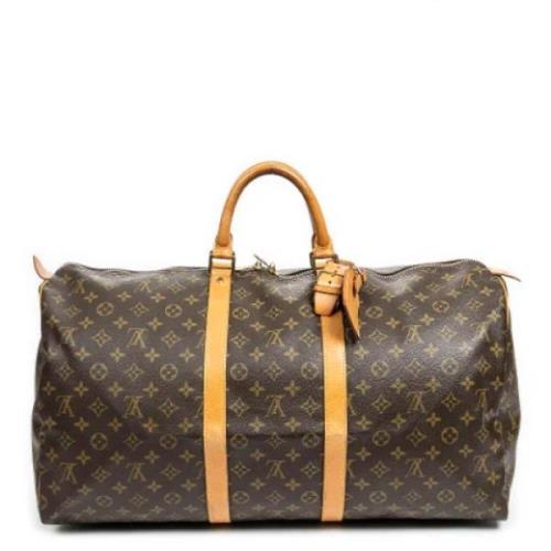 Pre-owned Canvas travel-bags Louis Vuitton Vintage , Brown , Dames