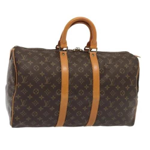 Pre-owned Canvas travel-bags Louis Vuitton Vintage , Brown , Dames