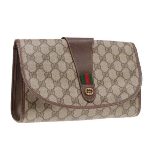 Pre-owned Leather clutches Gucci Vintage , Beige , Dames