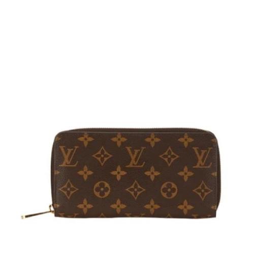 Pre-owned Leather wallets Louis Vuitton Vintage , Brown , Dames