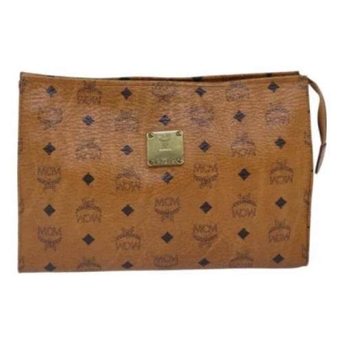 Pre-owned Canvas clutches MCM Pre-owned , Brown , Dames