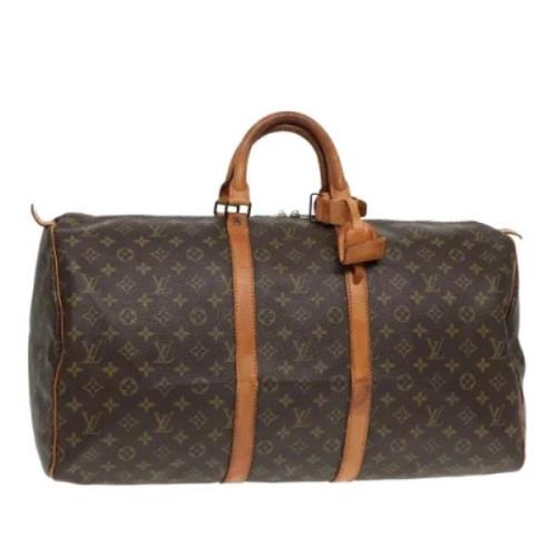 Pre-owned Canvas travel-bags Louis Vuitton Vintage , Brown , Dames